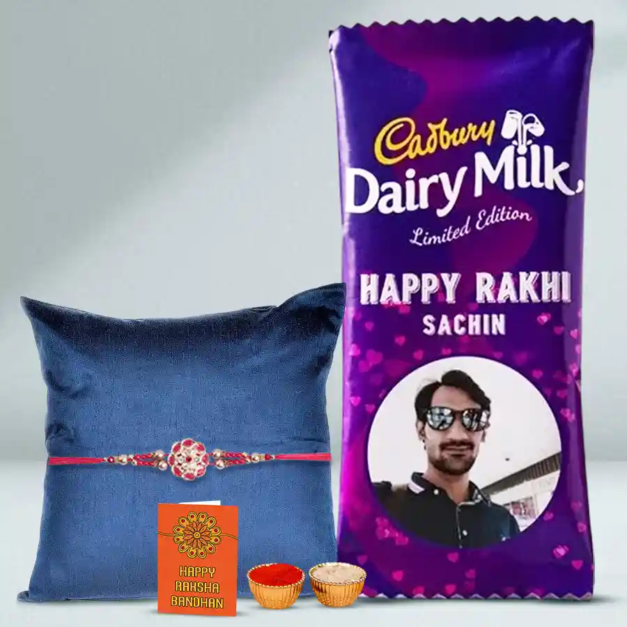 Personalized chocolate gift for Raksha Bandhan featuring Cadbury Silk, a premium Rakhi, and traditional sweets