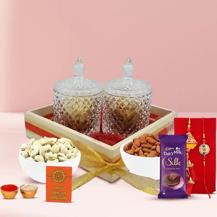 Couple Rakhi N Feast of Dry Fruits in Fancy Jars