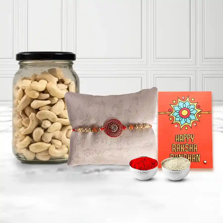 Crunchy Cashews in a designer Glass Jar with a Rakhi with free Roli Tilak Chawal