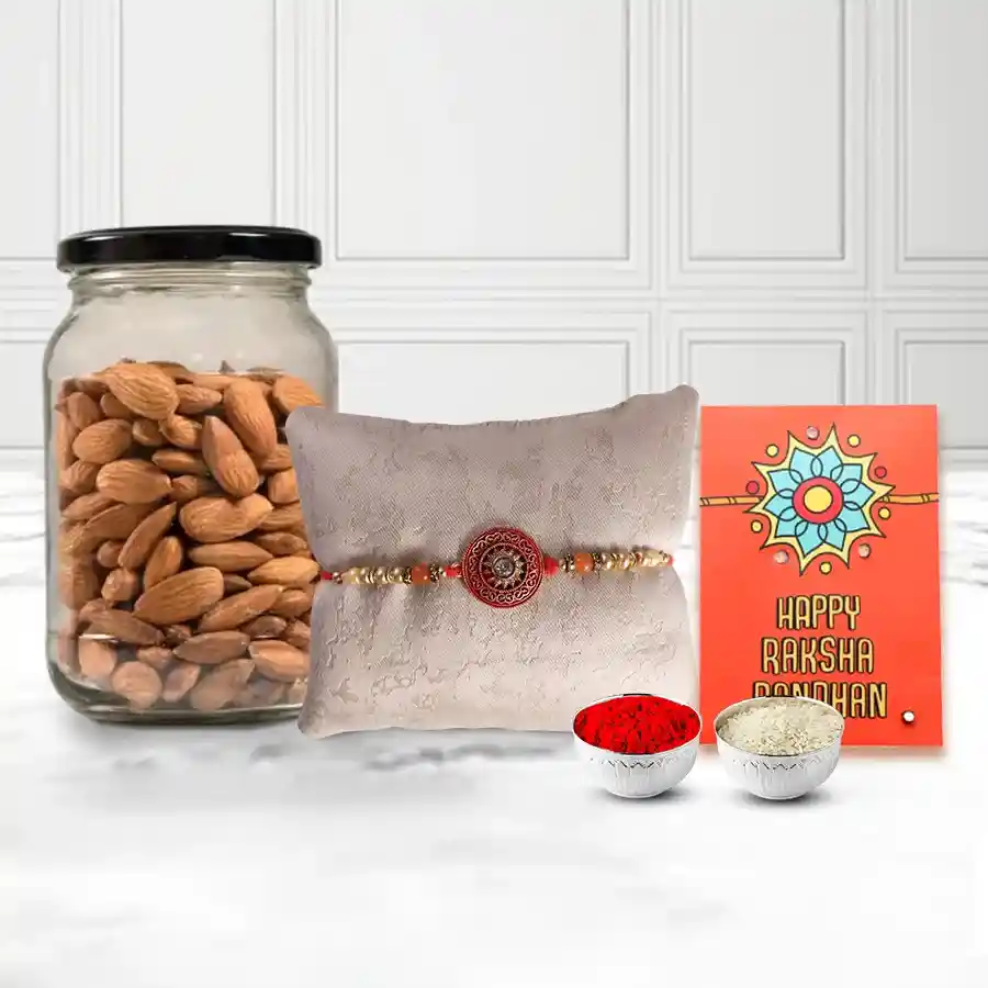 Healthy Almonds in a designer Glass Jar with a Rakhi with free Roli Tilak Chawal