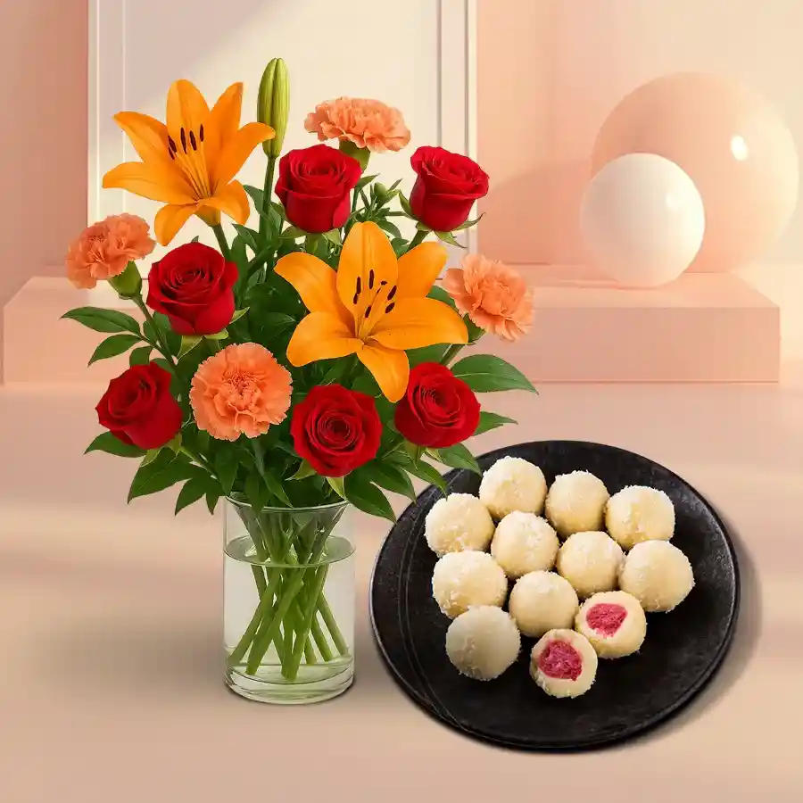 Floral Symphony N Khir Kadam Indulgence featuring mixed flowers and Bengali sweets.