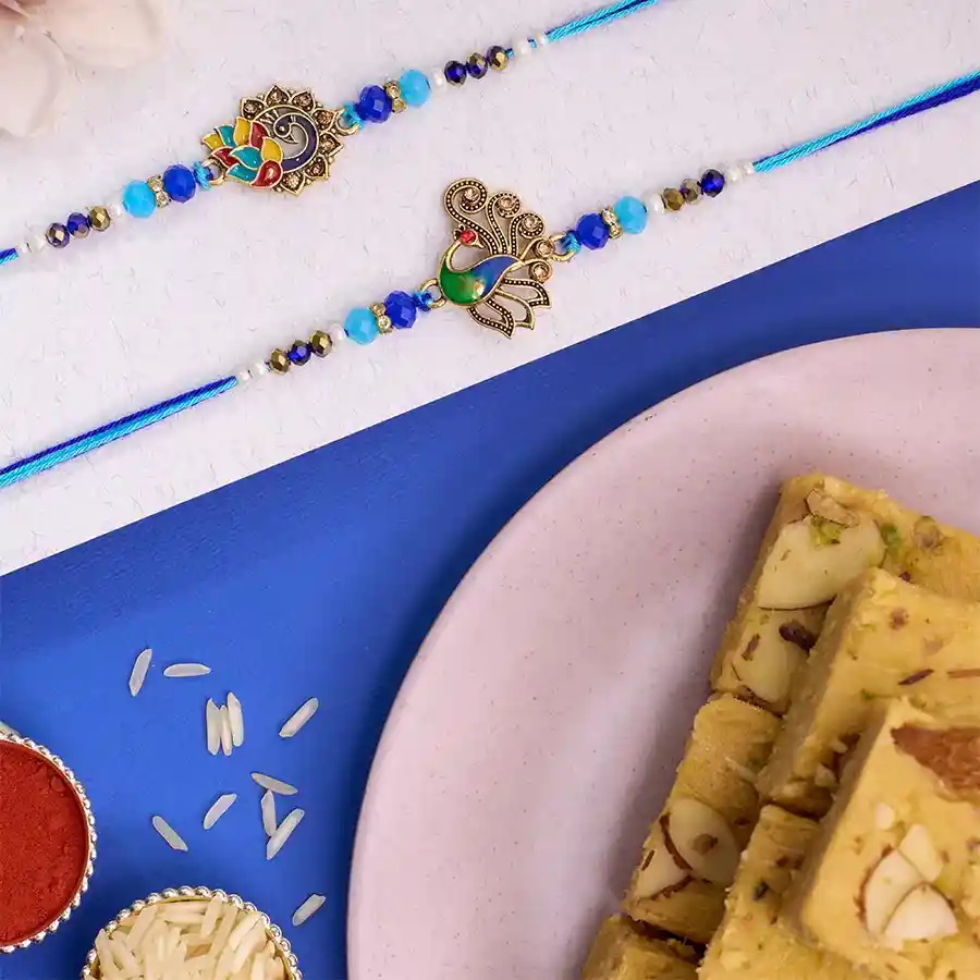 Twin Peacock Rakhi Set N Soan Papdi Surprise