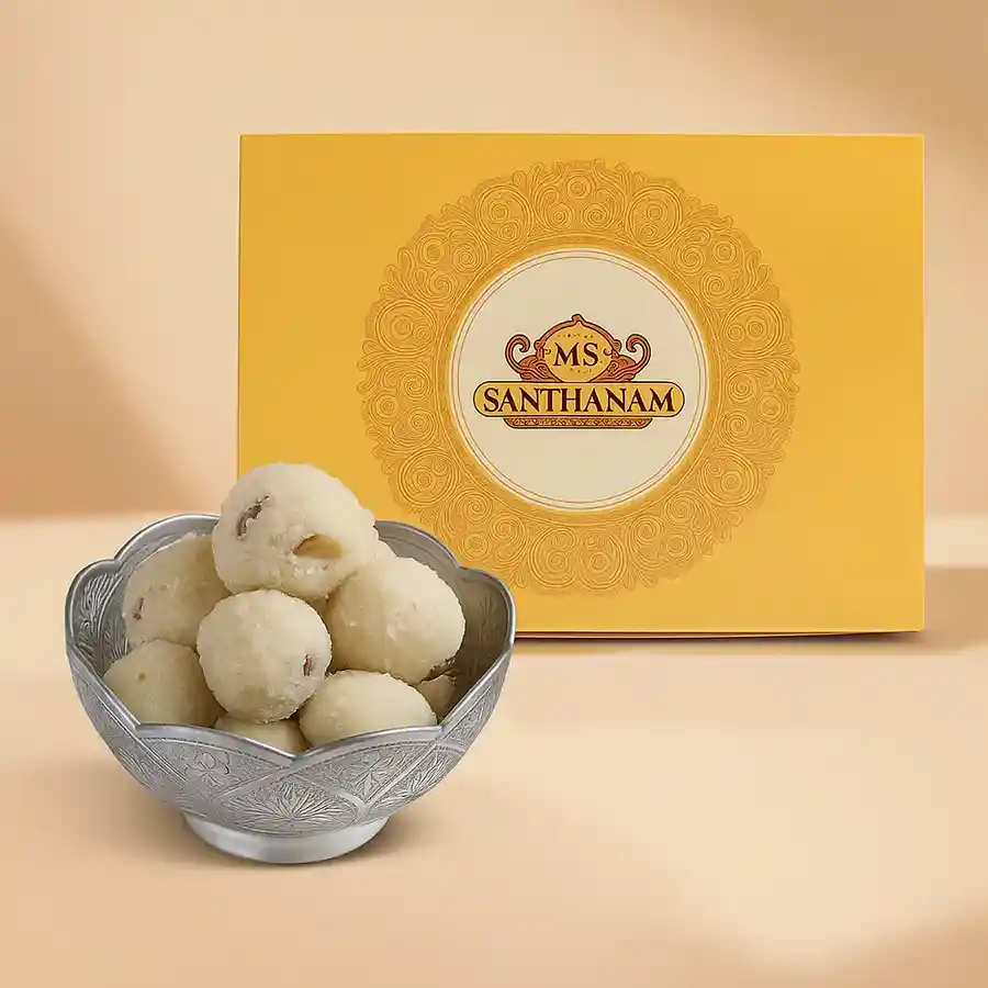 A box containing 10 pieces of soft and flavorful Rawa Laddus, made with semolina and cardamom, perfect for festive occasions.