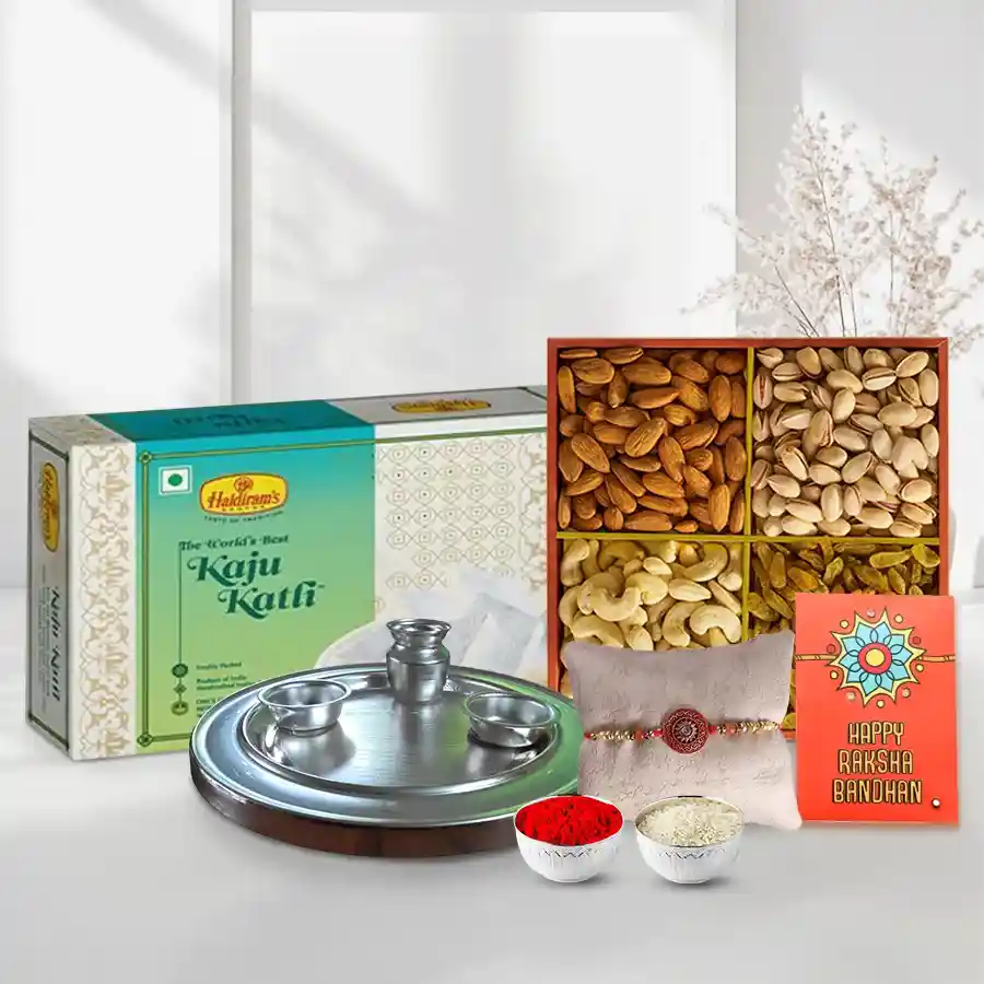 An amazing Silver plated Thali Haldiram Kaju Katli Dry Fruits with free Rakhi Roli Tilak and Chawal