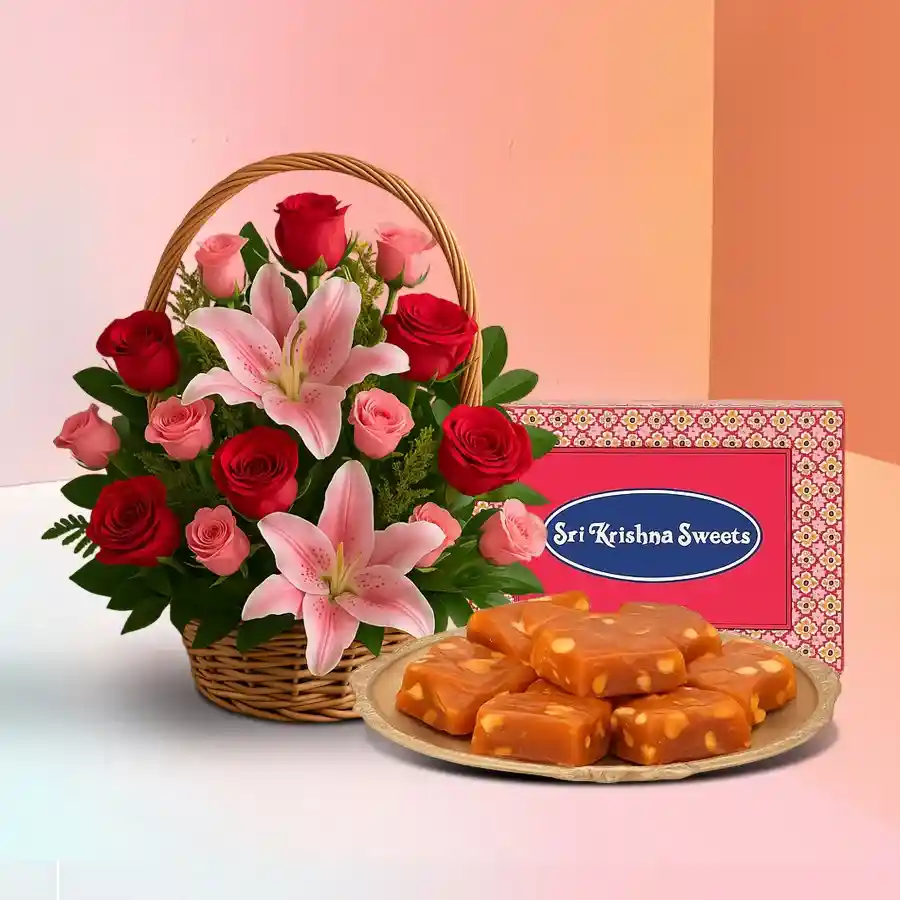 A beautiful basket with 12 roses, 4 pink lilies, and 250 grams of Bombay Halwa, symbolizing love and sweetness.