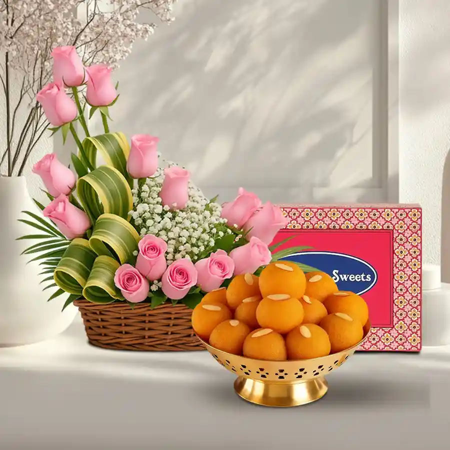 Gift combo featuring 25 pink roses and 250 grams of Motichur Laddu, beautifully arranged to celebrate special moments.