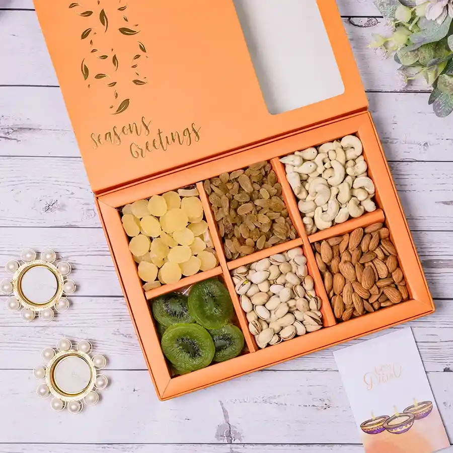 Festive Dry Fruits and Diyas Set with assorted dried fruits and two pearl diyas in a reusable gift box