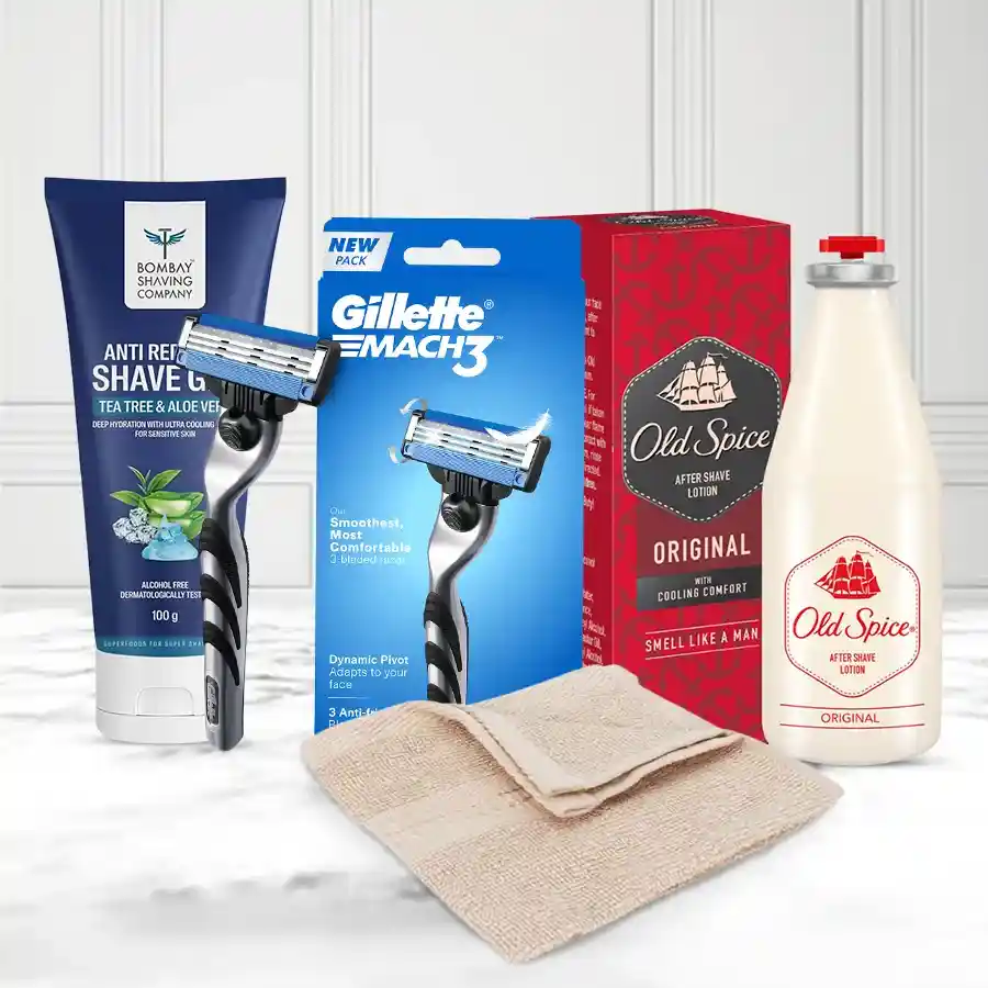 Ultimate Grooming Gift Set featuring shaving gel, razor, aftershave lotion, and face towel.