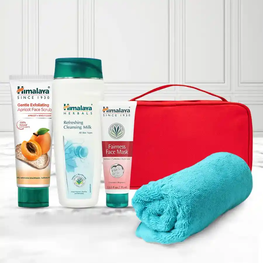 Charming Himalaya 3-in-1 Herbal Face Pack Hamper with kit bag, towel, scrub, face pack, and cleansing milk. Perfect for self-care and gifting.