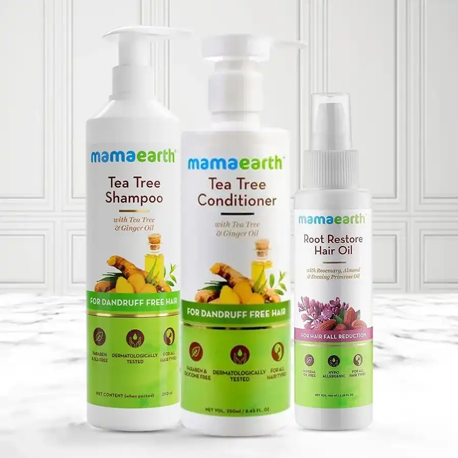 Nurturing Mama Earth Hair Care Set featuring shampoo, conditioner, and hair oil for healthy, beautiful hair.
