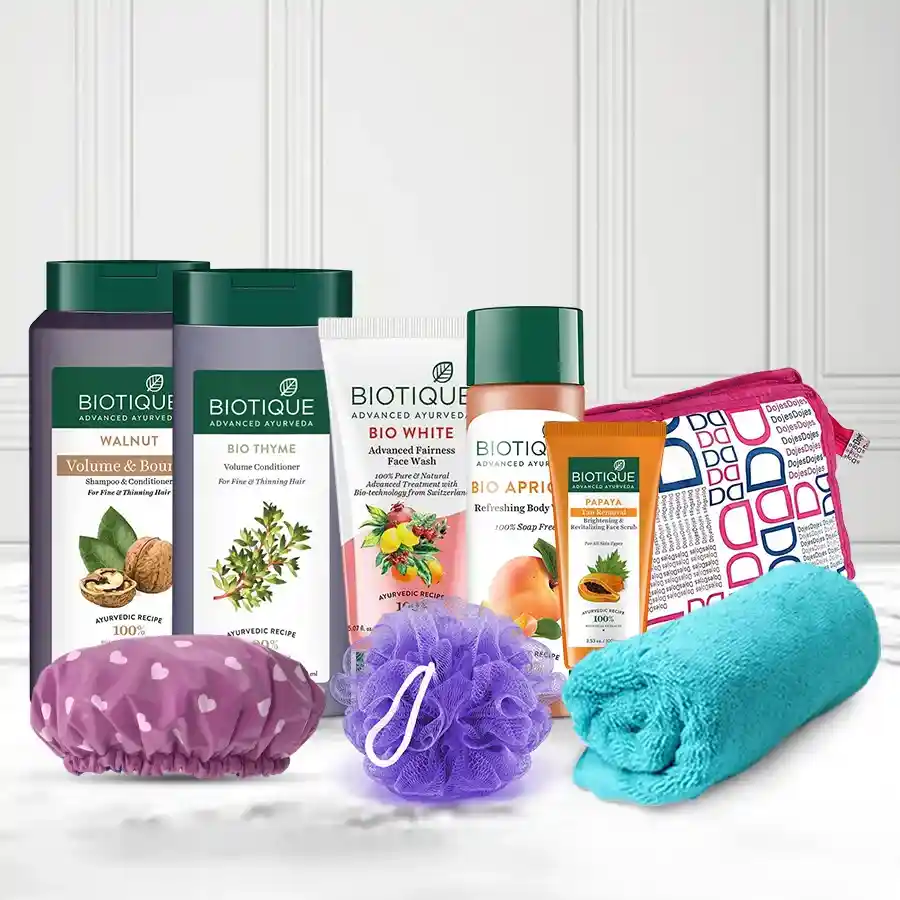 Biotique Ultimate Skin Care Gift Set featuring shampoo, face wash, conditioner, body wash, scrub, and accessories for a complete pampering experience.