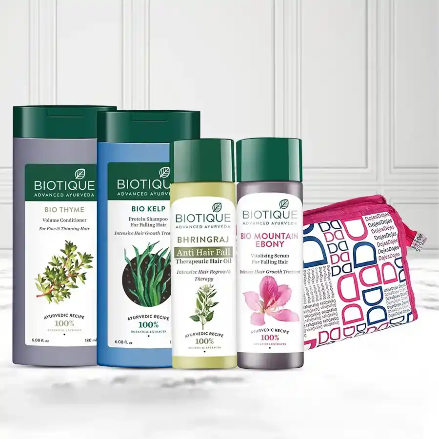 Biotique Hair Care Gift Set featuring serum, oil, shampoo, conditioner, and toiletry kit for healthy, beautiful hair.