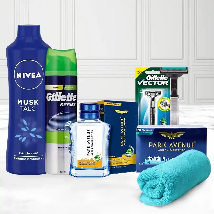 Refreshing Grooming Hamper for Men featuring deodorant, talc, shaving products, and towel. Perfect gift for self-care and grooming.