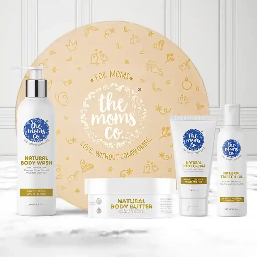 Ultimate Pregnancy Care Gift Box featuring natural body butter, body wash, stretch oil, and foot cream designed to pamper expectant mothers.