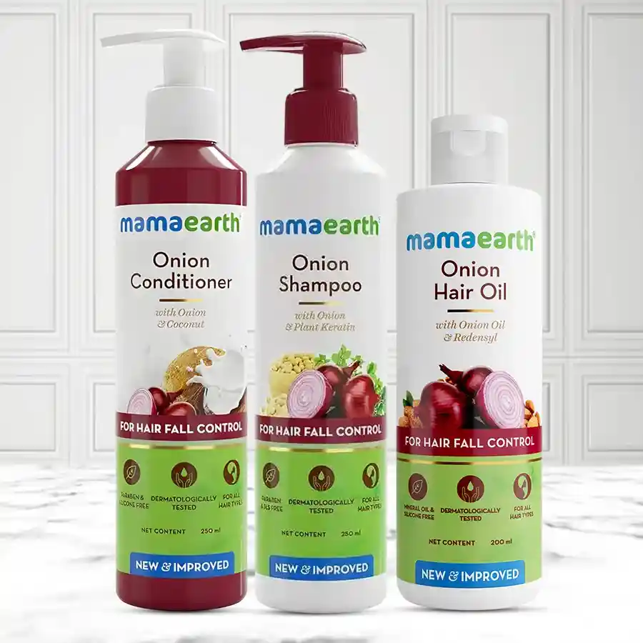 Ultimate Mamaearth Anti Hair Fall Gift Kit featuring Onion Conditioner, Shampoo, and Oil for healthy hair.