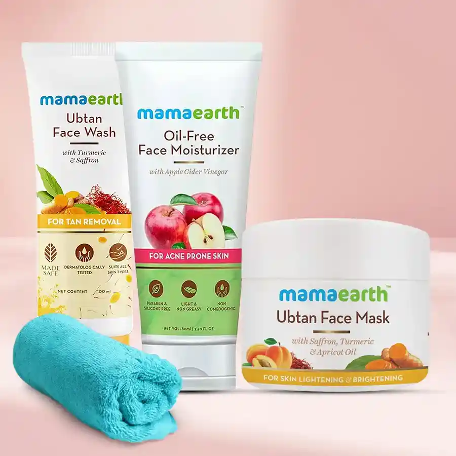 Mamaearth Natural Face Care Kit with face wash, moisturizer, face mask, soft towel, and toiletry pouch for glowing skin.
