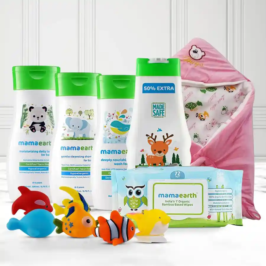 Cherished Newborn Care Gift Set by Mamaearth, featuring baby essentials like a blanket, body wash, lotion, shampoo, dusting powder, wipes, and toys.