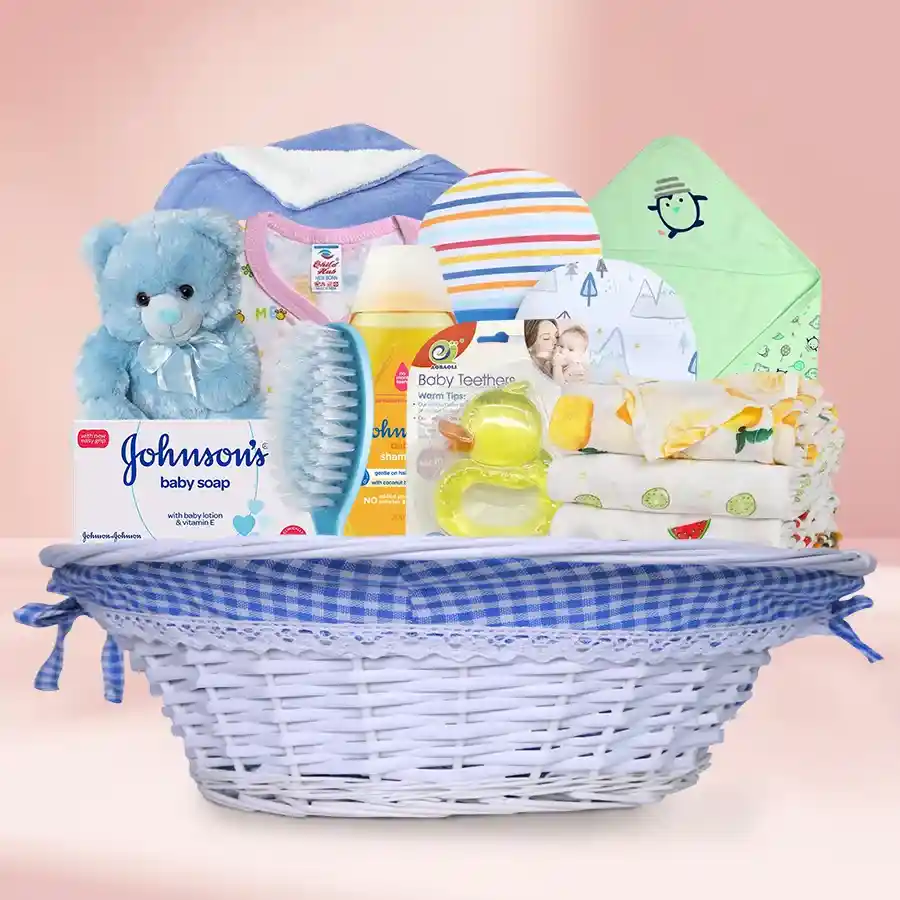 Cherished Teddy & Baby Essentials gift basket with baby care items and a cuddly teddy bear.