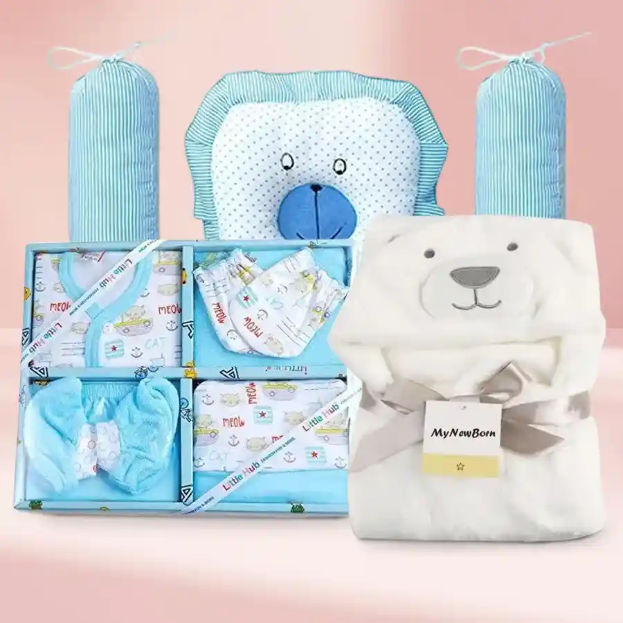 Cozy Baby Gift Set Delight featuring a blue infant dress set, white fleece wrapper blanket, and sky blue baby head pillow with side pillows.