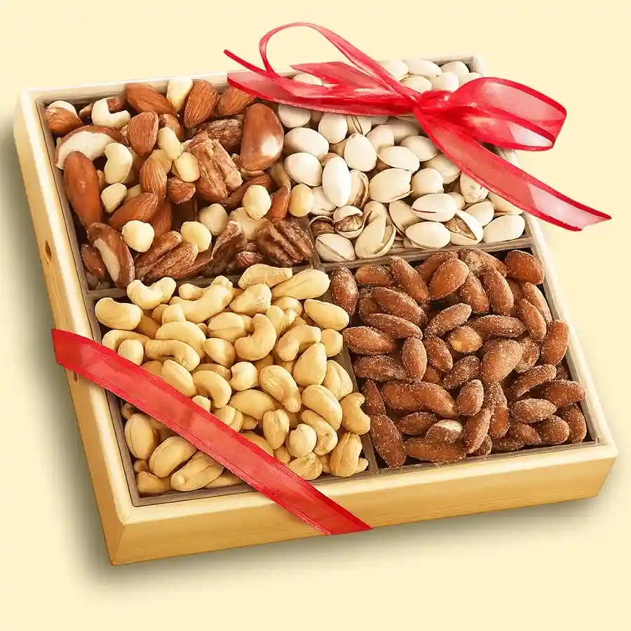 Premium wooden tray filled with salted almonds, peanuts, cashews, and pistachios for celebrations.