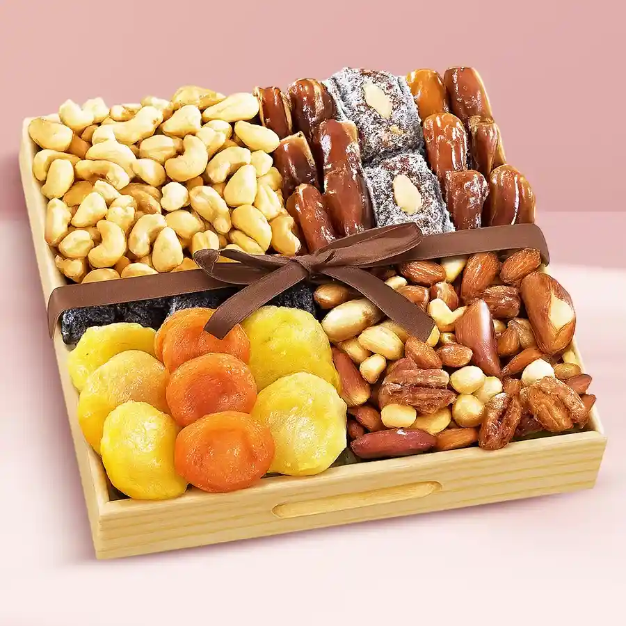 Gourmet Dry Fruits Gift Tray featuring Dried Apricots, Prunes, Dates, Roasted Almonds, and Cashews in a wooden tray.
