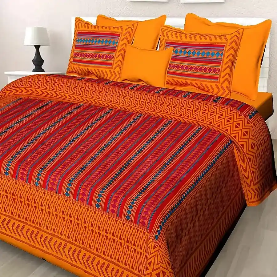 Vibrant Jaipuri print double bed sheet and pillow covers in yellow, showcasing beautiful Indian craftsmanship.
