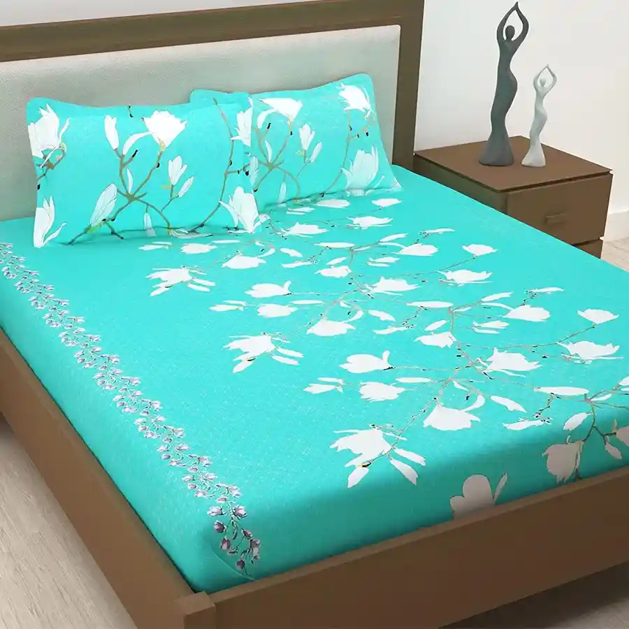 Aqua Green Floral Bed Sheet Set with matching pillow cover, made of soft cotton, perfect for adding charm and comfort to a single bed.