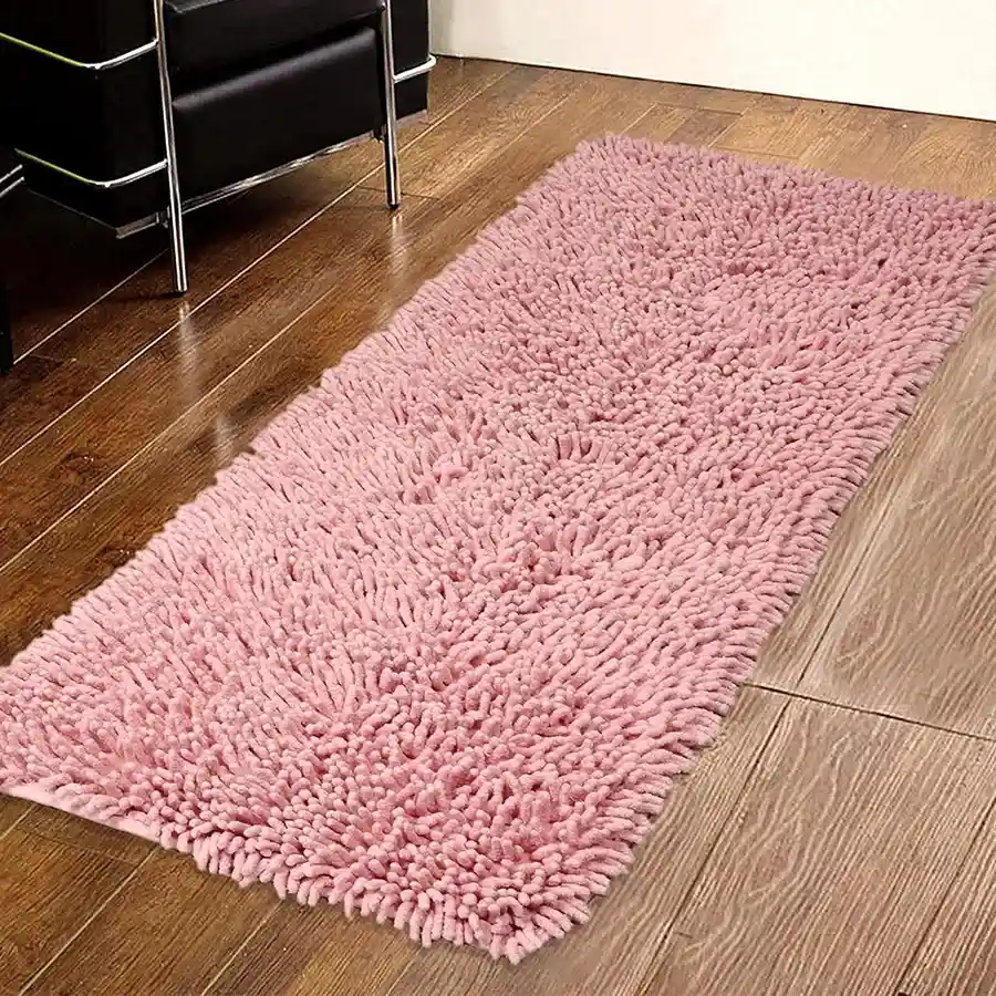 Charming Light Pink Plaid Runner showcasing a tufted design, ideal for adding warmth and style to any dining space.