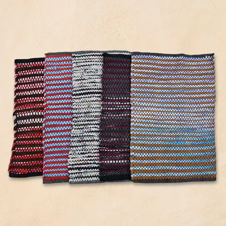 Classic reversible striped multicolor cotton blend bath mat, hand loomed and washable, perfect for home decor and gifting.