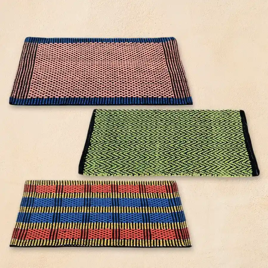 Charming set of 3 multicolour cotton blend doormats, hand-loomed, measuring 40x60 cm, perfect for welcoming guests at your doorstep.