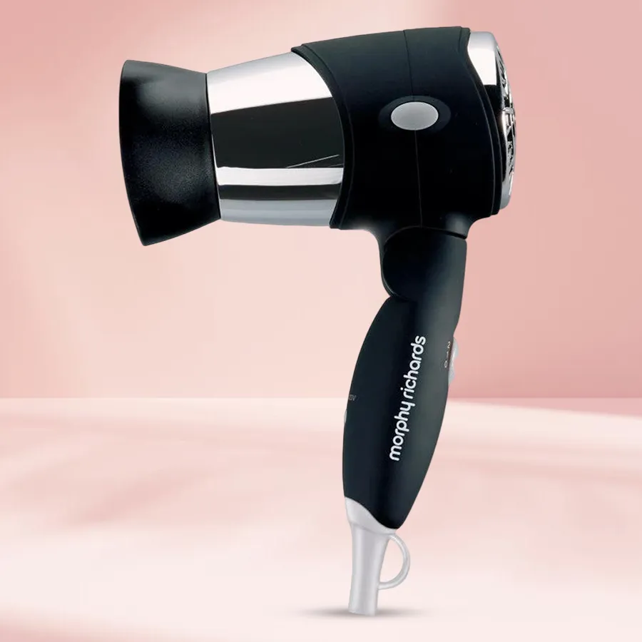 Morphy Richards Stylish Travel Hair Dryer for Men with foldable handle and safety features. Perfect for travel and everyday use.