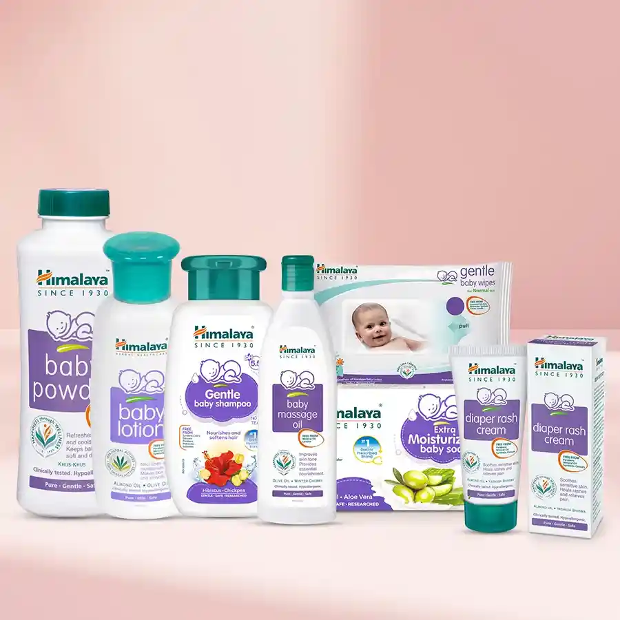 Joyful Babycare Essentials Gift Pack from Himalaya featuring lotion, powder, cream, shampoo, soap, oil, and wipes for infants.