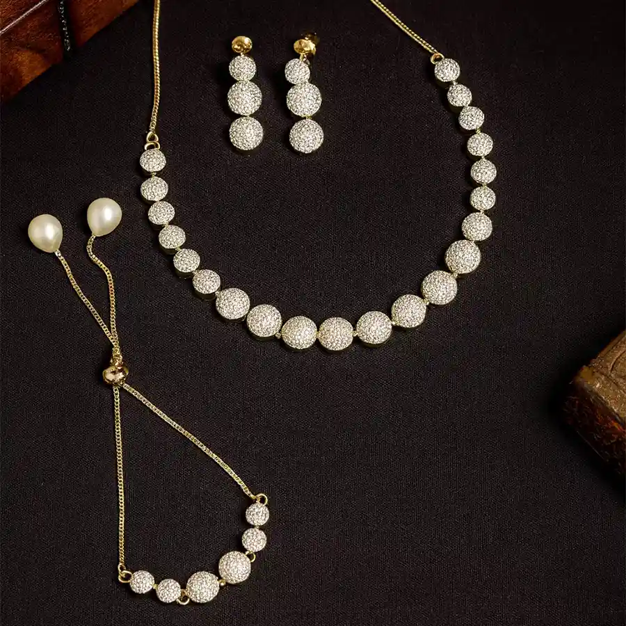 Glamorous AD Studded Jewelry Set featuring a choker necklace, earrings, bracelet, and ring, designed for elegance and luxury.