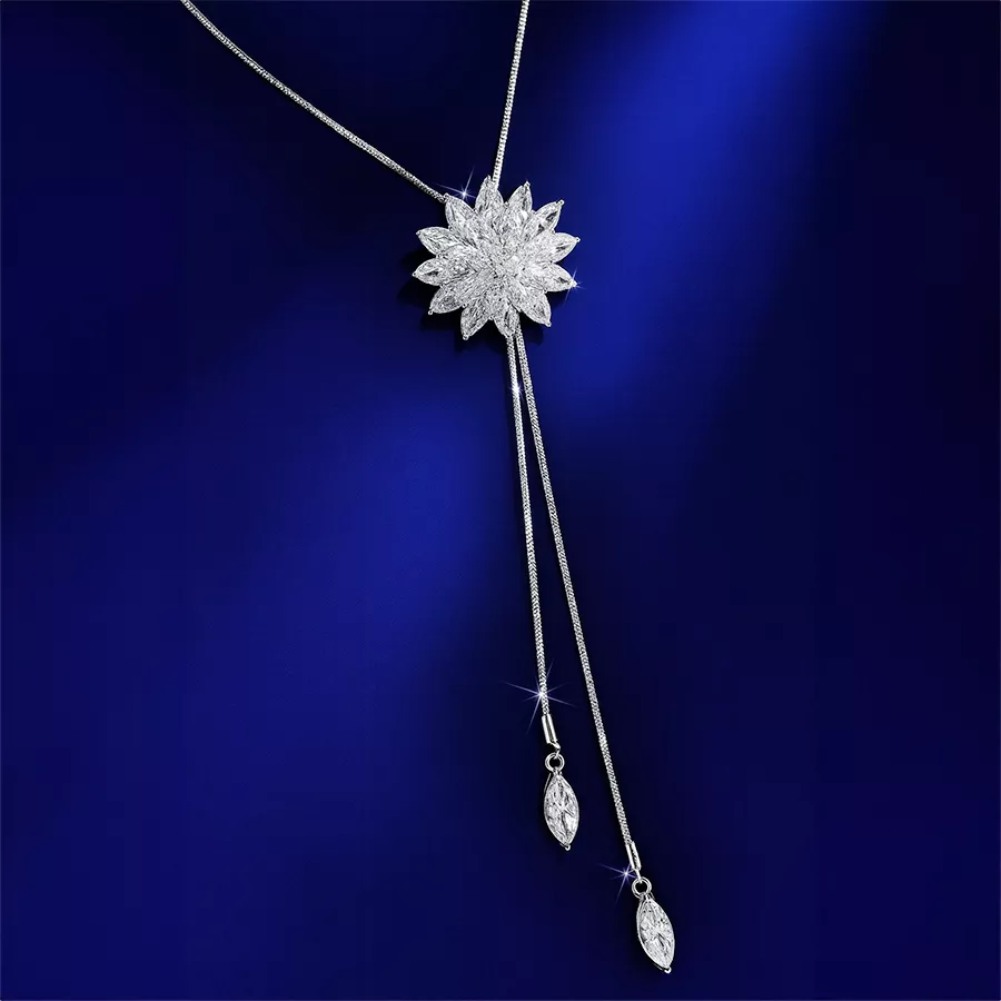Enchanting Crystal Floral Necklace featuring a crystal flower pendant on a long chain. Perfect for elegant occasions and thoughtful gifts.