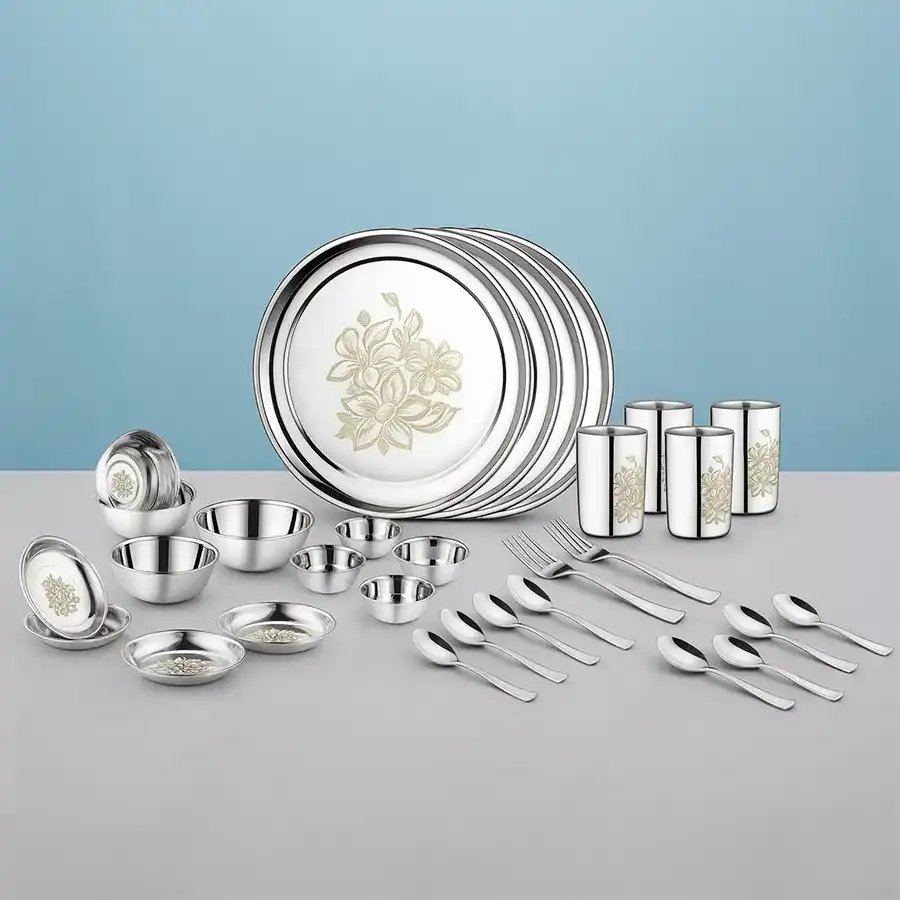 Amusing Jensons Stainless Steel Daisy Dinner Set, 32 pieces in silver, perfect for festive dining occasions.