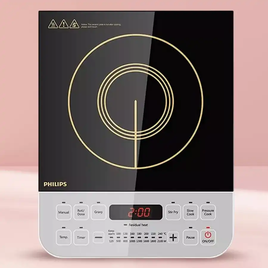 Philips HD Induction Cooktop in silver and black, showcasing a sleek design and jog dial control for efficient cooking.