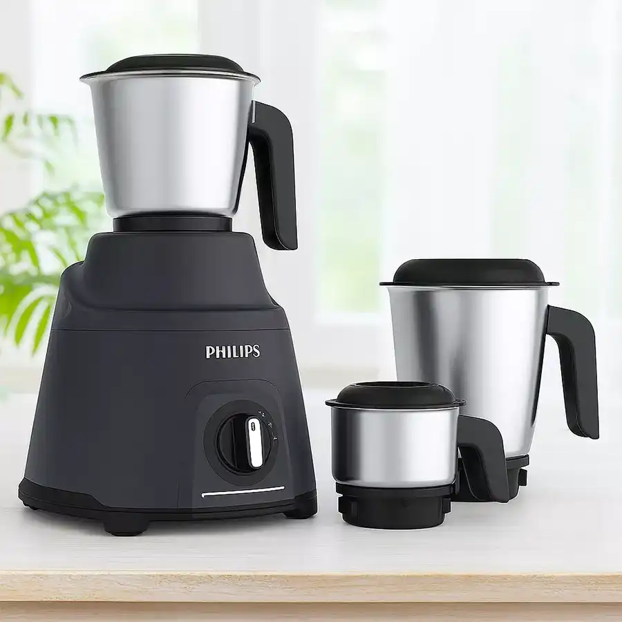 Philips Avengers Mixer Grinder in grey with spatula, three jars, and powerful 750W motor.