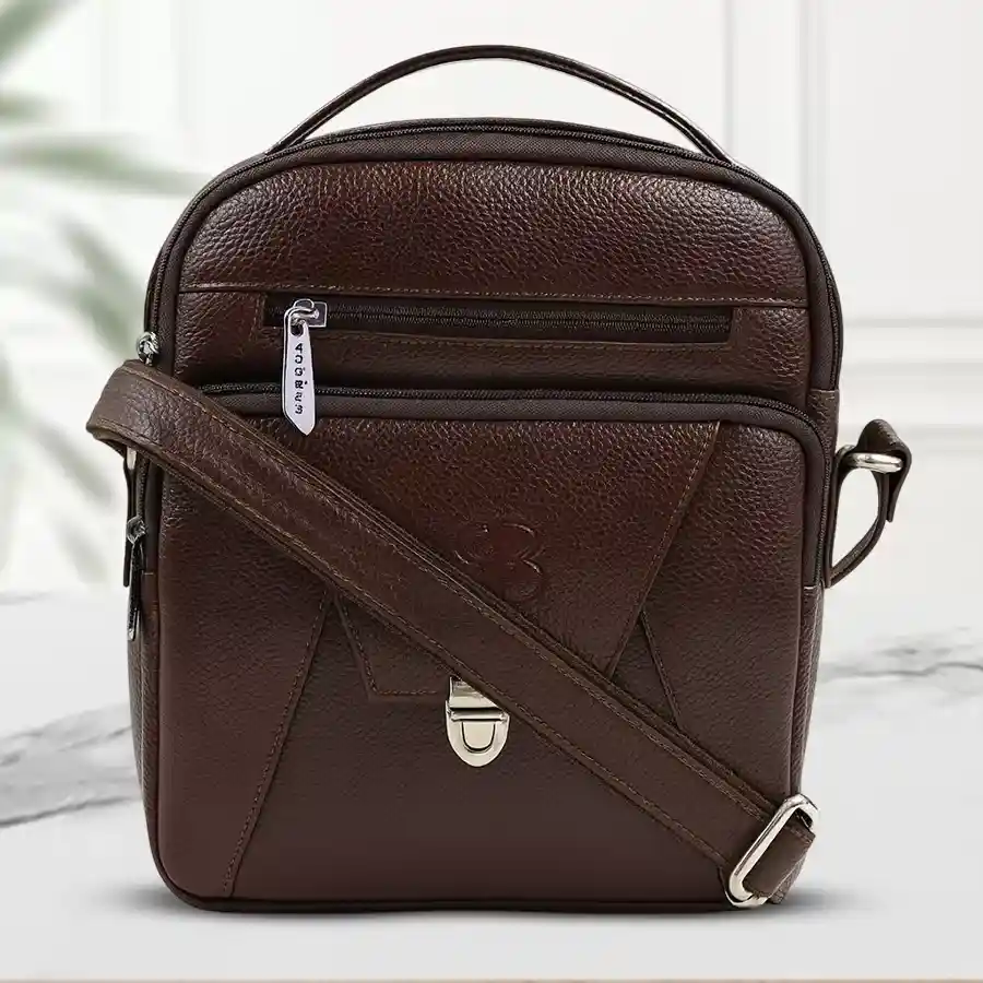 Trending Gents Sling in Dark Brown leather with a front lock pocket.