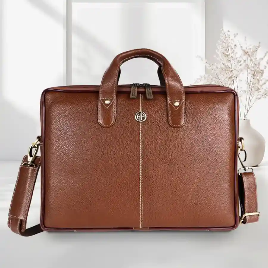 Remarkable mens leather laptop bag in Brushwood, fitting 14-16 inch laptops, featuring adjustable shoulder strap and multiple compartments.
