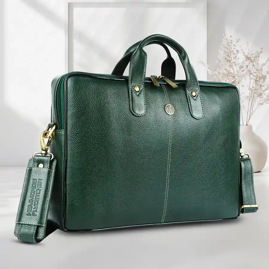 Elegant green laptop bag for men, crafted from genuine leather, fits up to 14-inch laptops, perfect for professional settings.