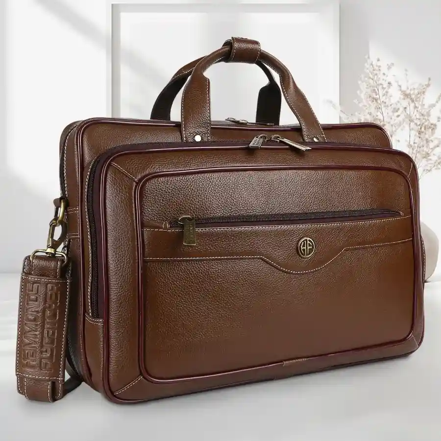 Sophisticated leather laptop bag for men in Brushwood color, designed to fit up to a 16-inch laptop with multiple compartments for organization.