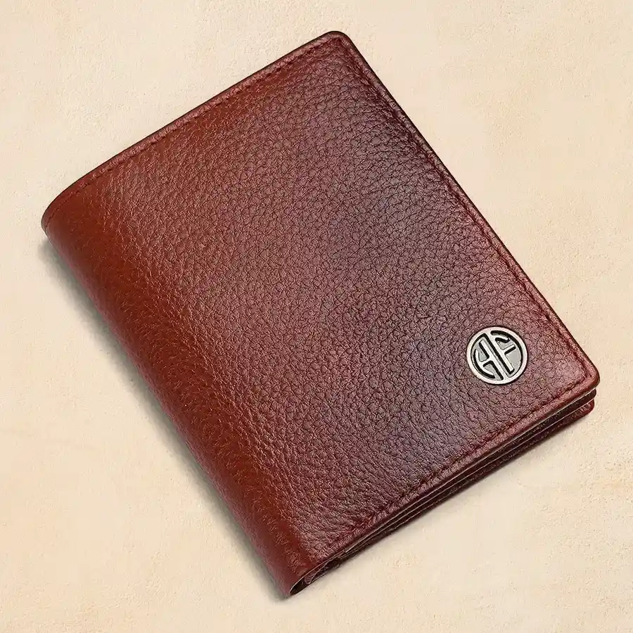 Stylish RFID Leather Bi-Fold Wallet in Tan, featuring a slim design and RFID protection for secure storage.