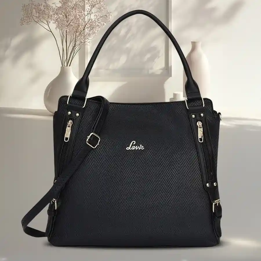 Lavie Faroe Faux Leather Ladies Satchel Bag in black, featuring slip and zip pockets for organized storage.