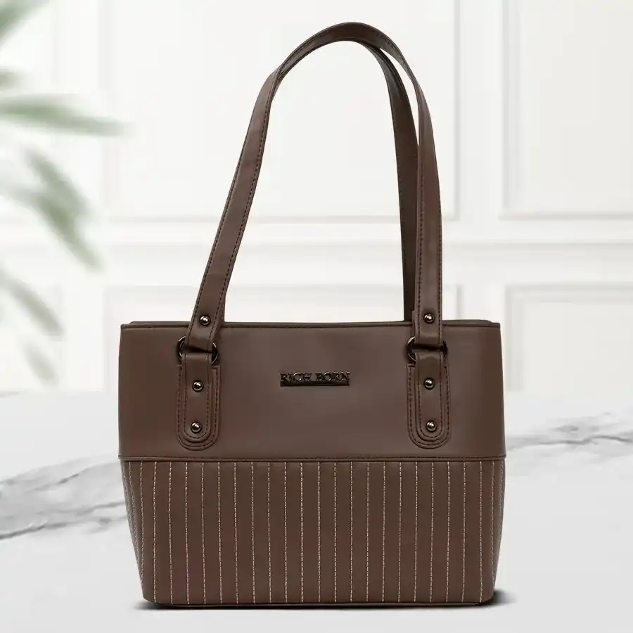 Luxe Brown Shoulder Bag made of faux leather with a front zip and two chambers, perfect for gifting.