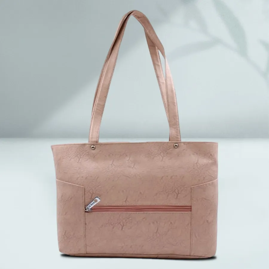 Stylish double chamber ladies vanity bag in peach faux leather, featuring a front zip and two spacious compartments for organization.