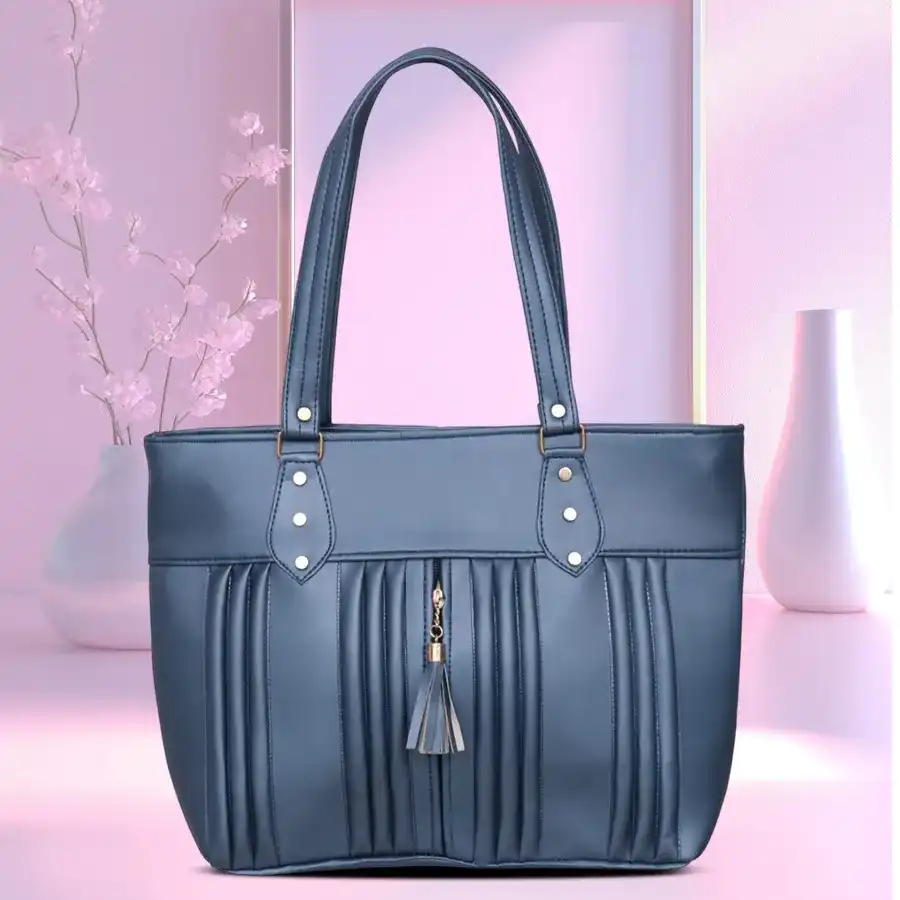 Elegant blue shoulder bag for ladies with embossed design and double zip, crafted from faux leather. Perfect for stylish outings.