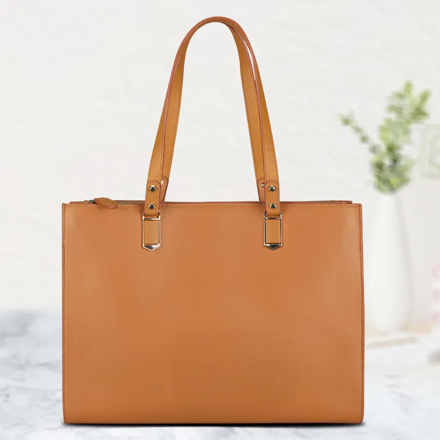 Stylish tan vanity bag for women with embossed design and double zip features. Perfect accessory for everyday elegance.