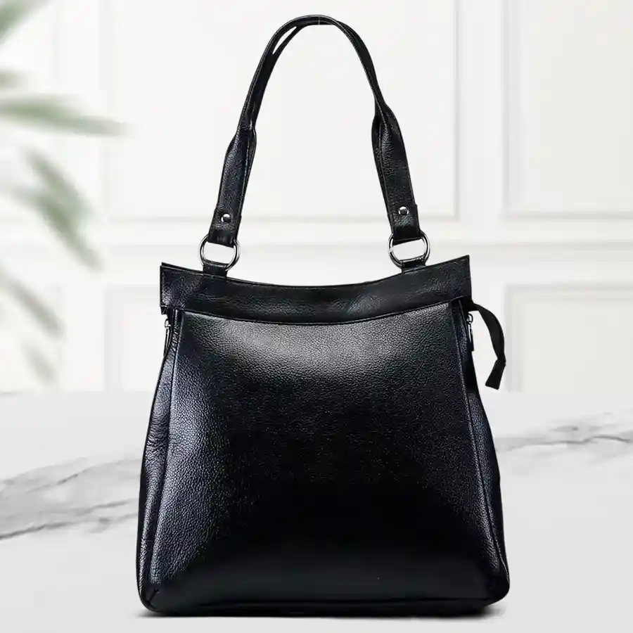 Chic black women's shoulder bag with intricate embroidery, crafted from faux leather. Perfect for everyday use or as a thoughtful gift.