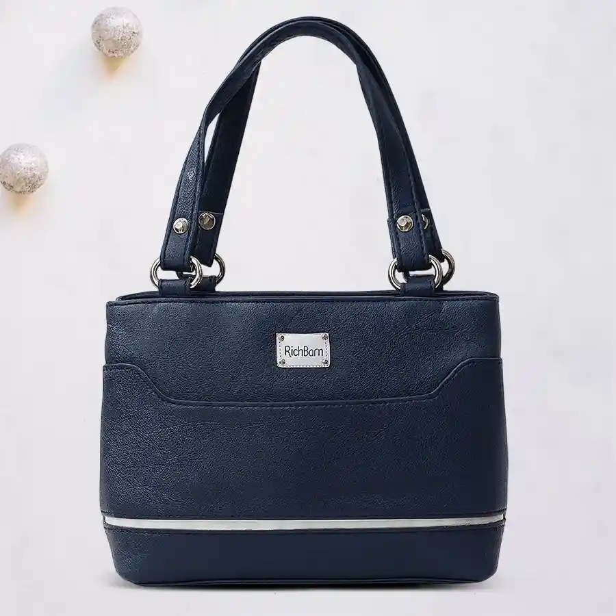 Designer Ladies Mini Vanity Bag in blue with white border, featuring two compartments, made of faux leather.