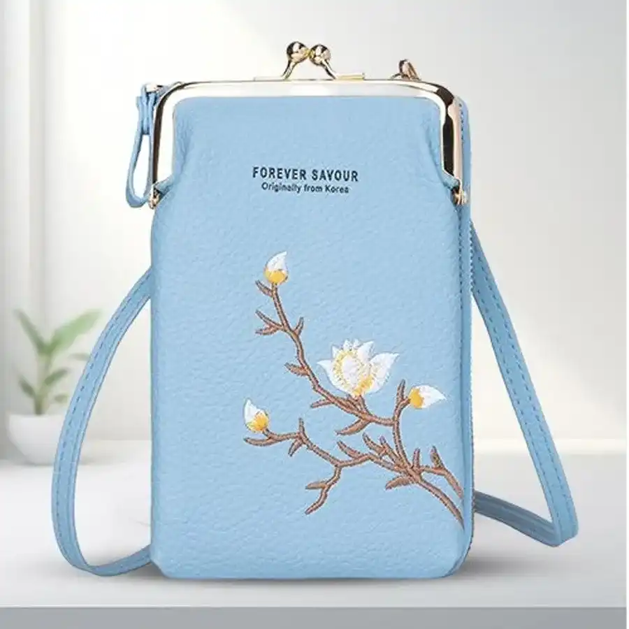 Chic light blue crossbody sling bag for women, featuring secure zipper closure and compartments for phone, cash, and cards.